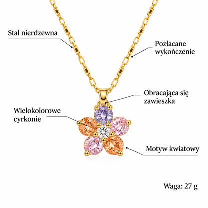 Specyfikacja naszyjnika: stal nierdzewna, pozlacane wykonczenie, wielokolorowe cyrkonie, obracajaca sie zawieszka, motyw kwiatowy, waga 27 g